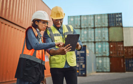 two port workers checking