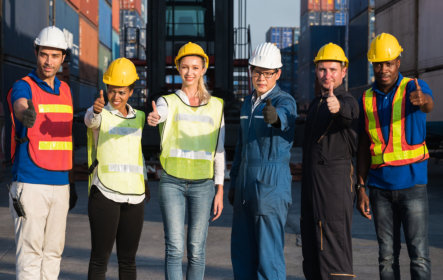 diverse port workers smiling