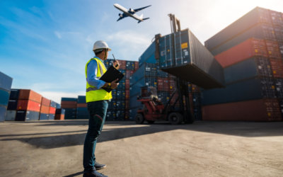 man checking container van being transferred